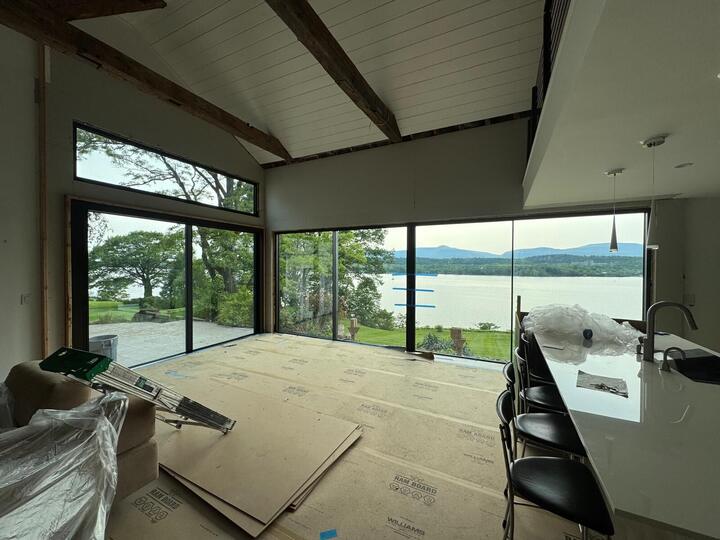 Lake-view window wall during installation