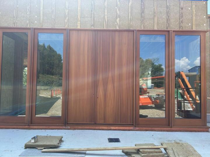 Wood-framed glass doors, newly installed