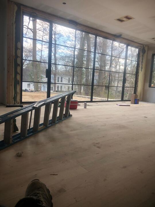 Floor-to-ceiling grid window wall, interior view