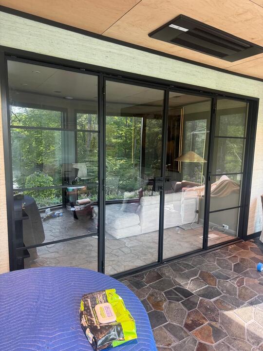 Sliding glass wall with a black grid
